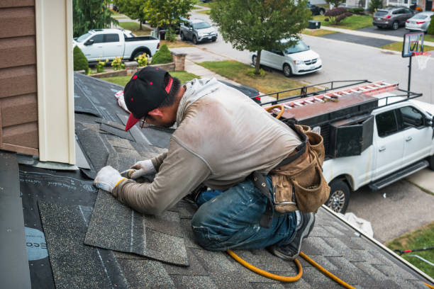 Professional Roofing technician working in Georgetown, MA